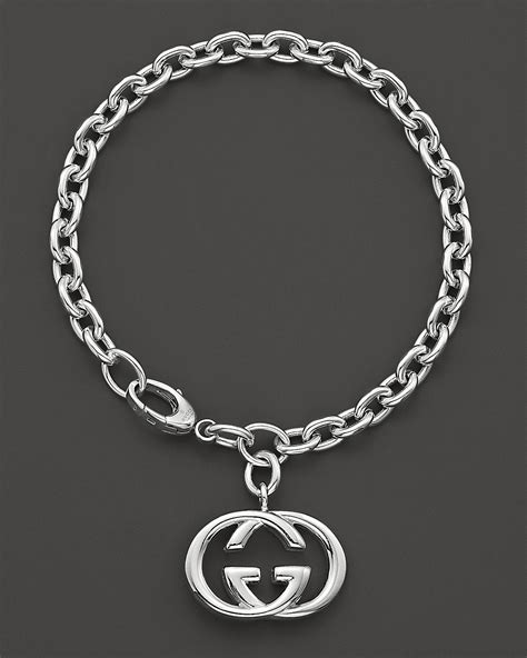 bracciale gucci silver britt|Gucci Britt Double G Charm Bracelet in Sterling Silver.